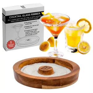 Elegant acacia wood glass rimmer displayed with salt-rimmed glasses and fresh citrus, inviting a sensory cocktail experience.