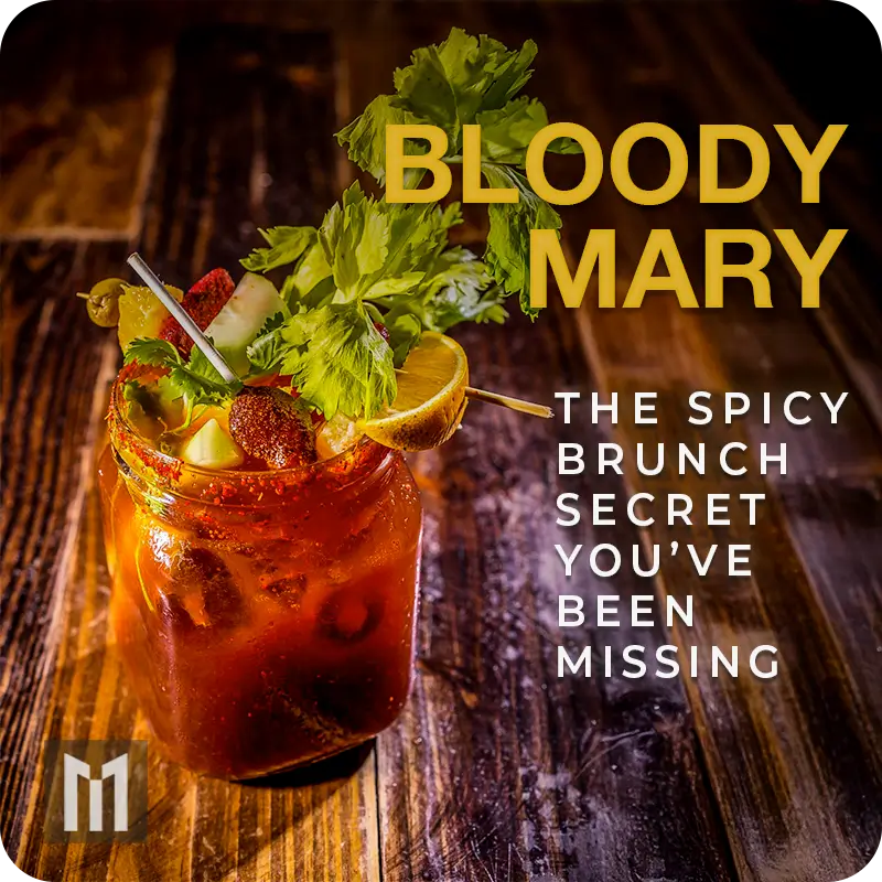 Spicy Bloody Mary in mason jar with celery, olives, lime, and chili garnish on rustic wooden table.